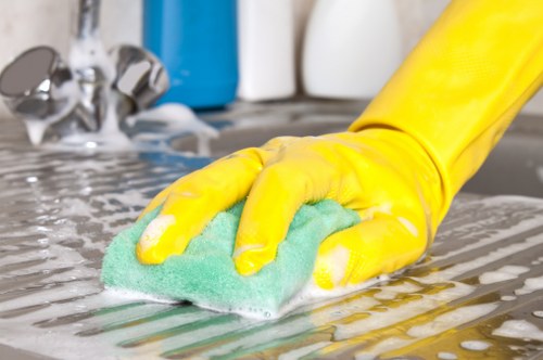 Professional cleaners working in a Kingston retail and customer-facing space